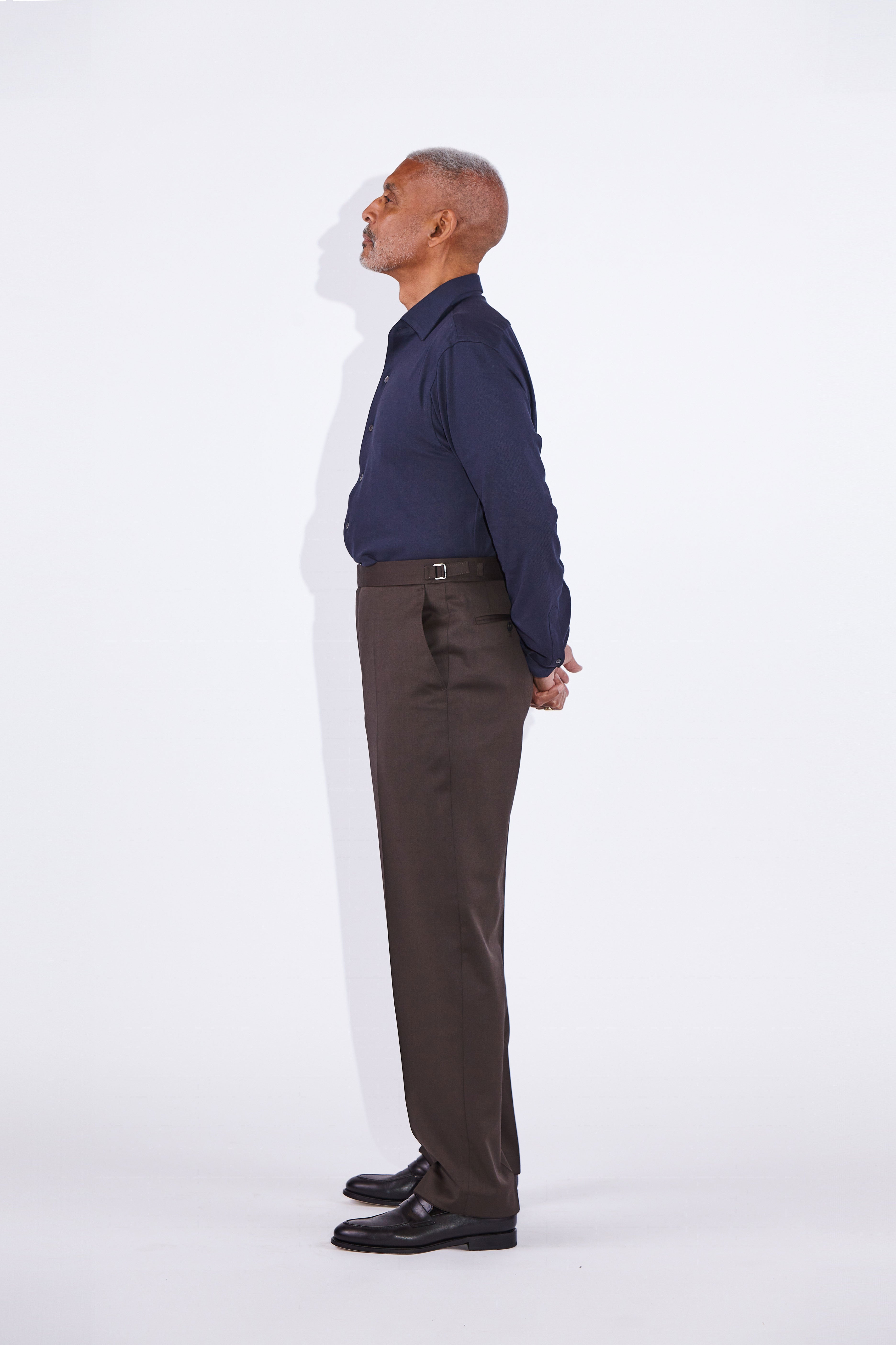 Model wears Casely-Hayford Jesper Navy One Piece Collar Pique Shirt. 