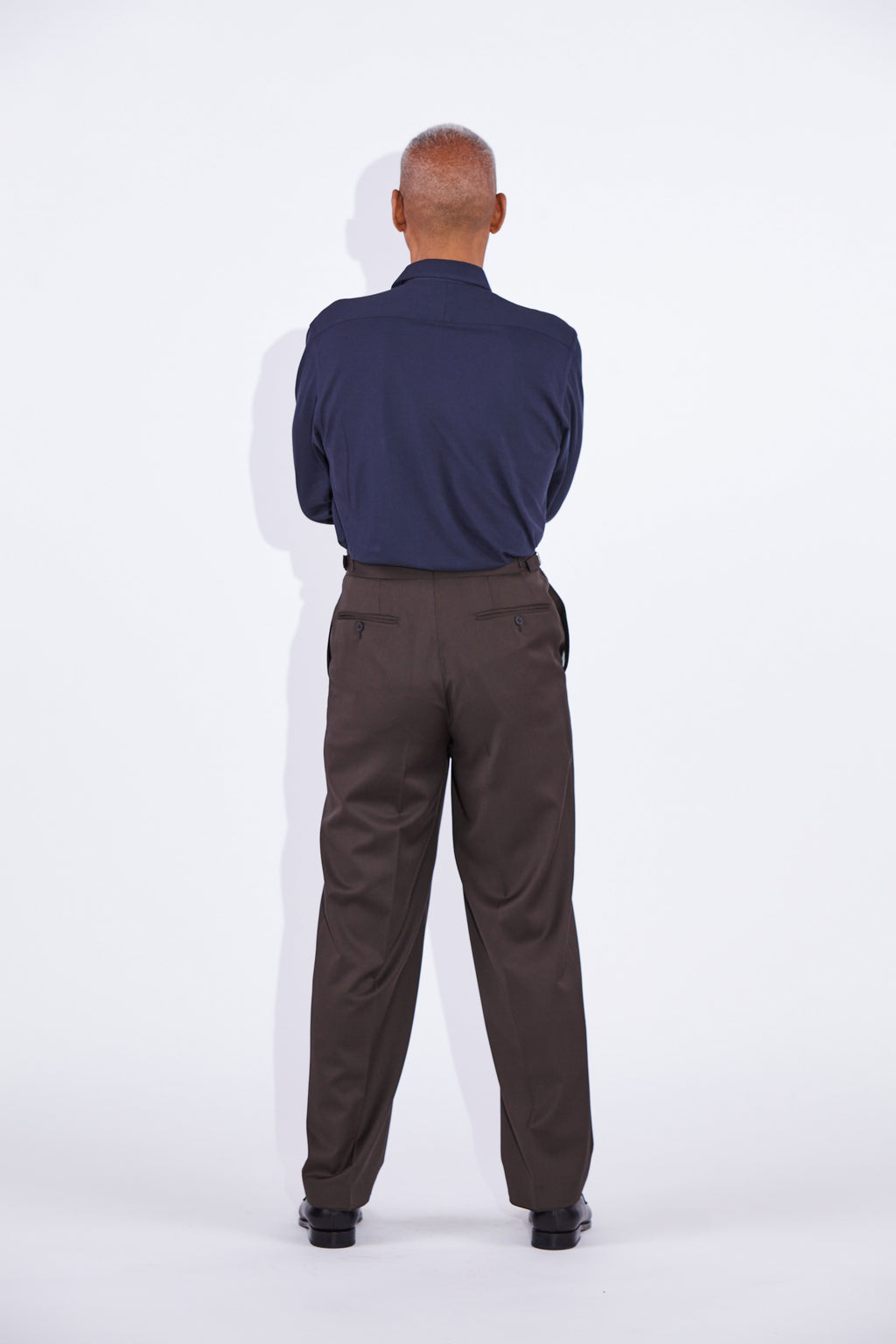 Model wears Casely-Hayford Jesper Navy One Piece Collar Pique Shirt. 