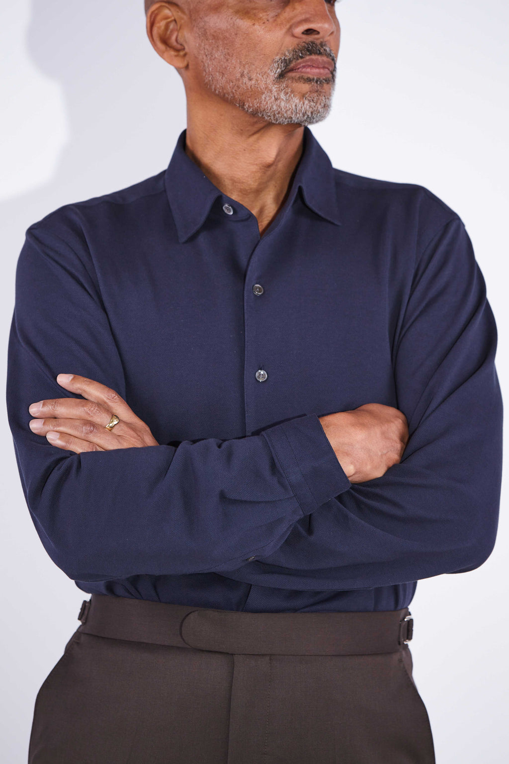 Model wears Casely-Hayford Jesper Navy One Piece Collar Pique Shirt. 