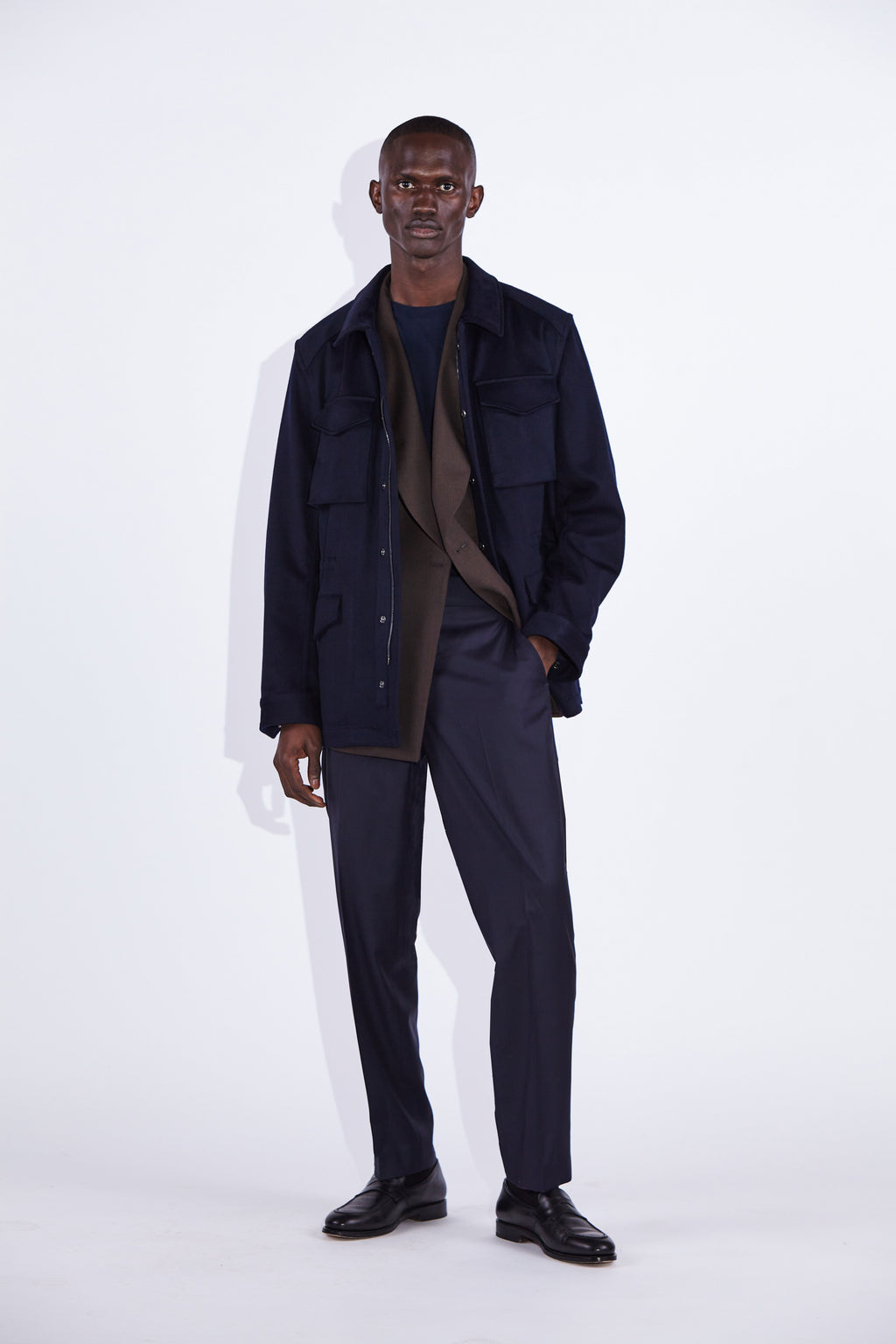 Model wear Casely-Hayford Fabian Navy Field Cotton Corduroy Jacket. 