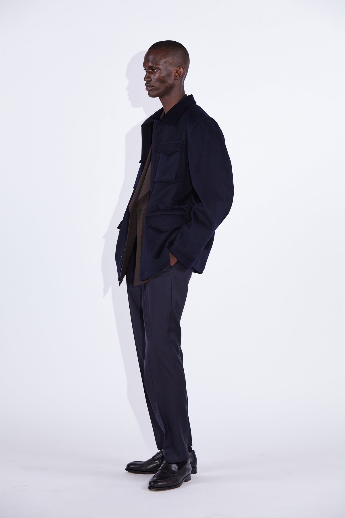 Model wear Casely-Hayford Fabian Navy Field Cotton Corduroy Jacket. 