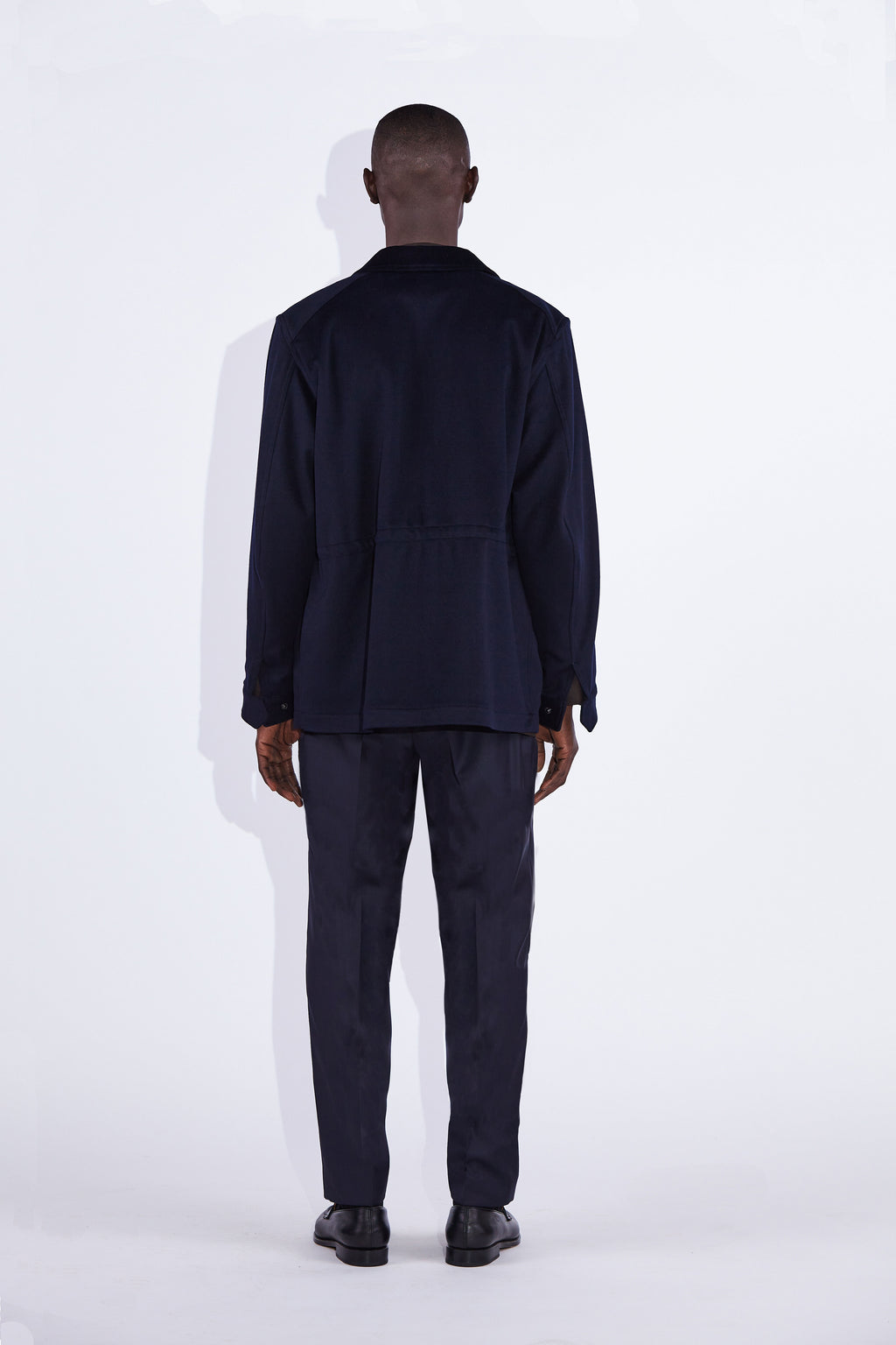 Model wear Casely-Hayford Fabian Navy Field Cotton Corduroy Jacket. 