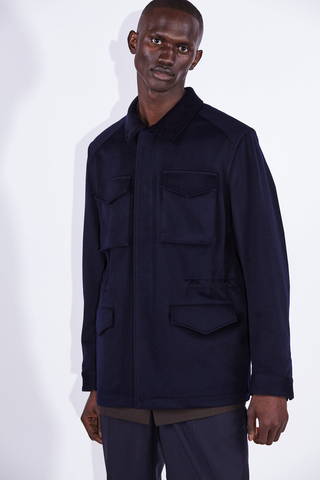 Model wear Casely-Hayford Fabian Navy Field Cotton Corduroy Jacket. 