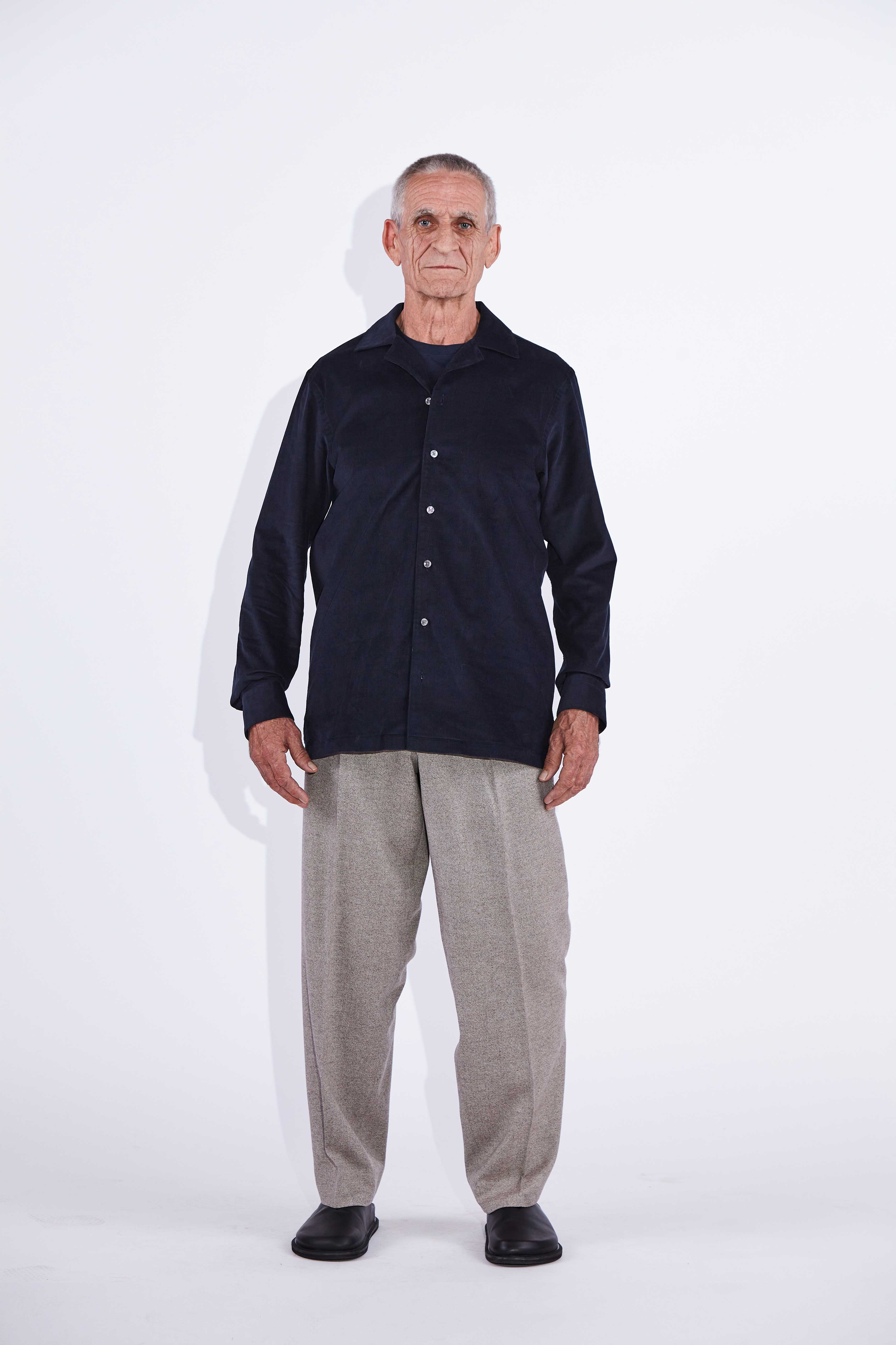 Model wears Jax Navy Camp Collar Corduroy Shirt. 