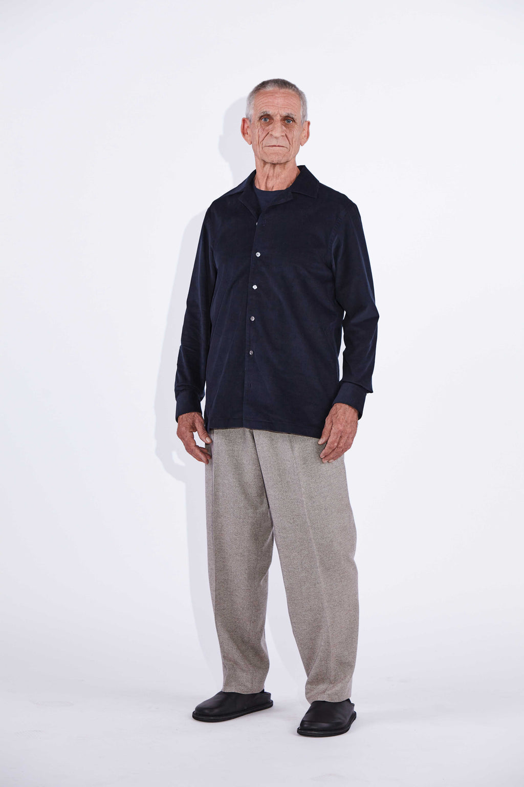 Model wears Jax Navy Camp Collar Corduroy Shirt. 