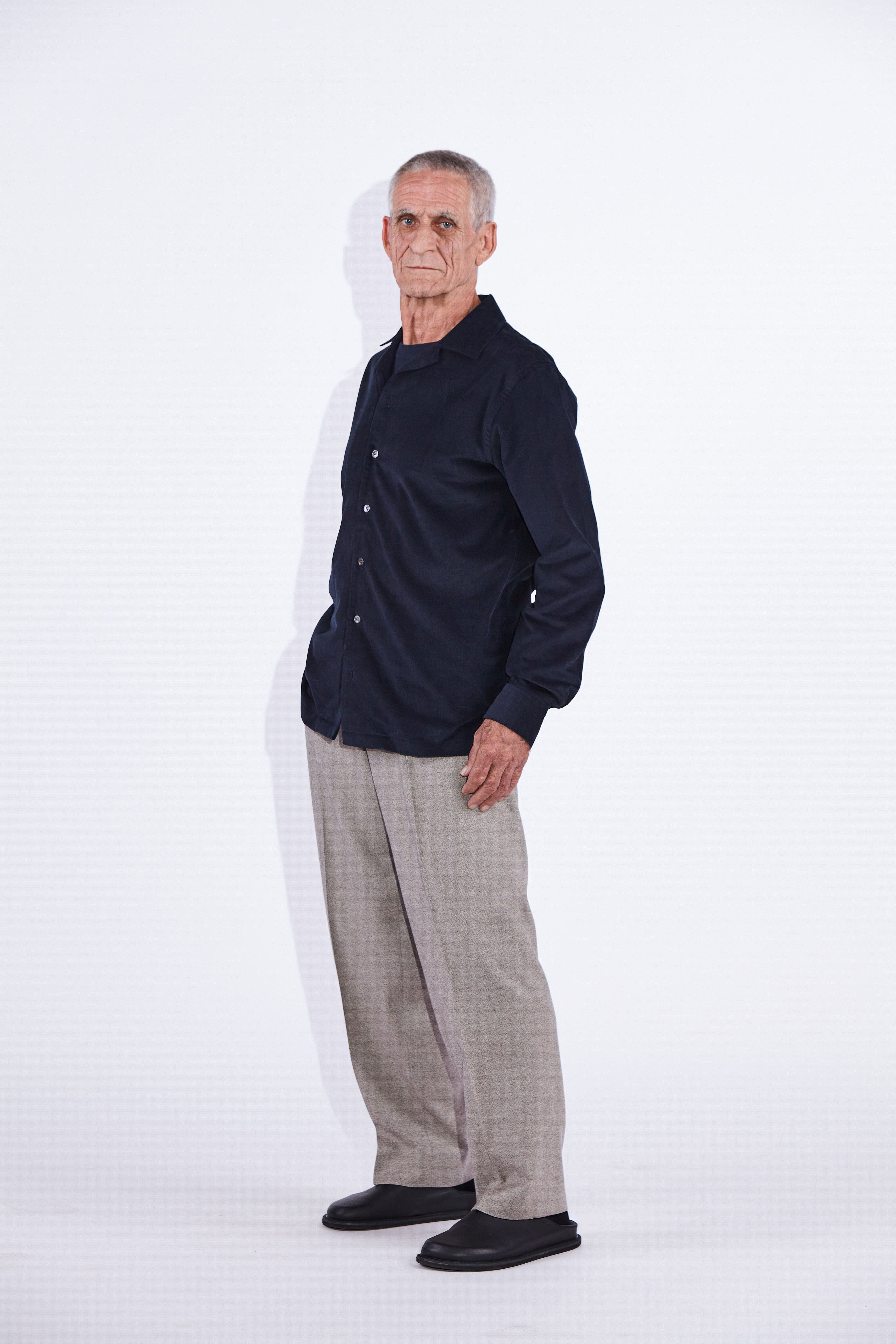Model wears Jax Navy Camp Collar Corduroy Shirt. 