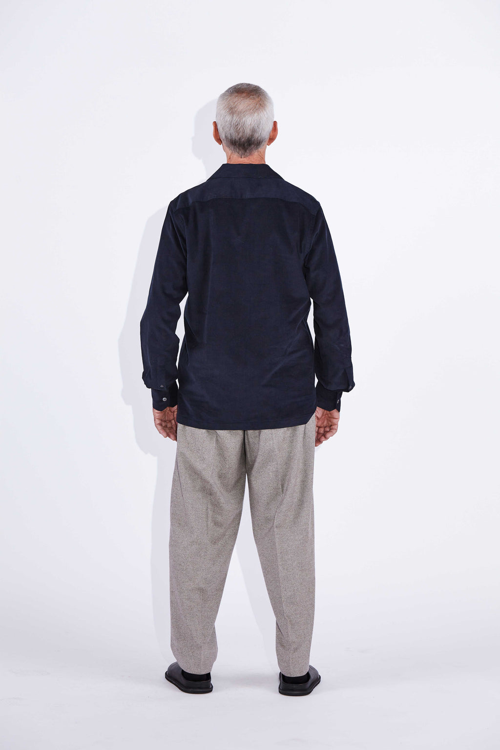 Model wears Jax Navy Camp Collar Corduroy Shirt. 