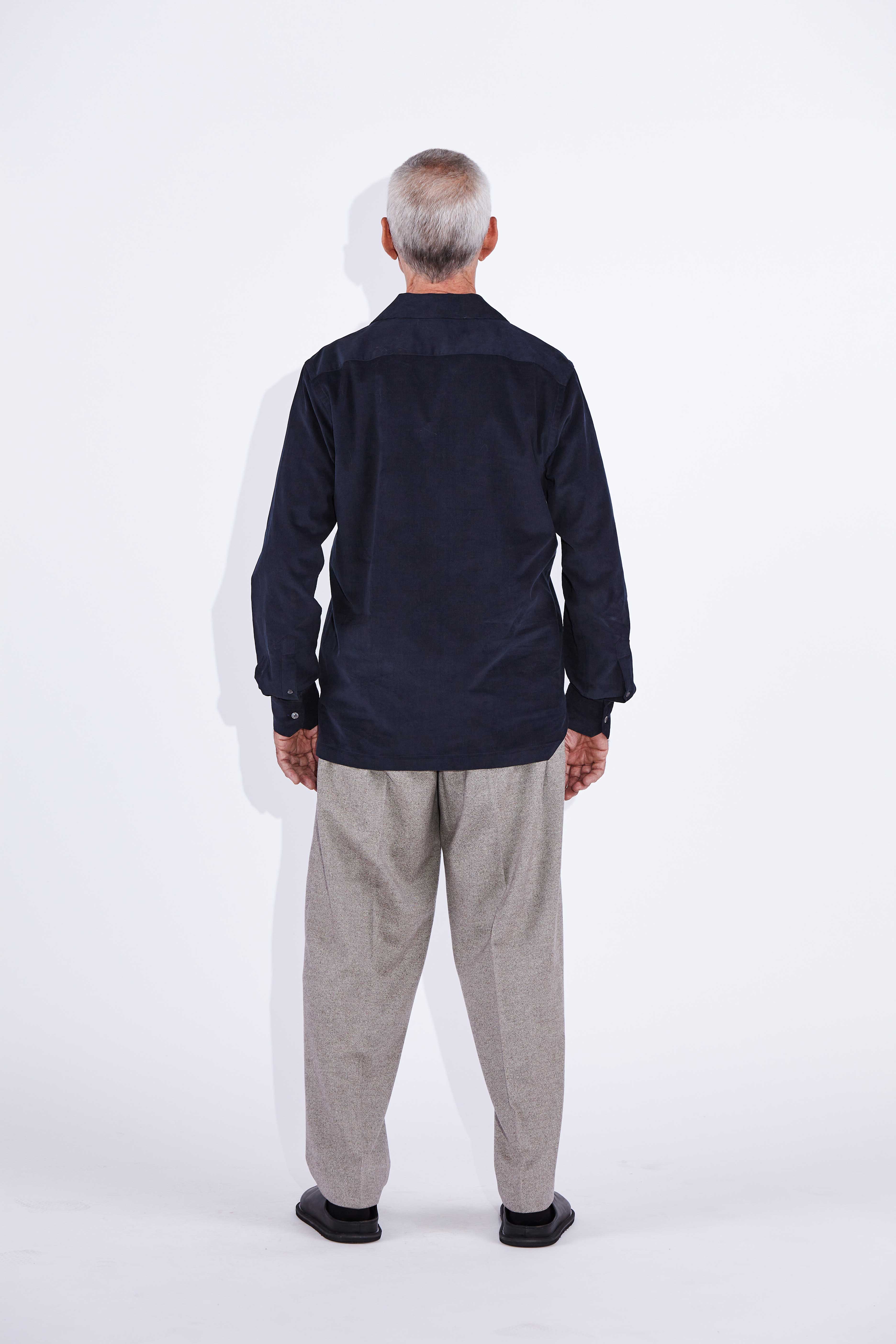 Model wears Jax Navy Camp Collar Corduroy Shirt. 