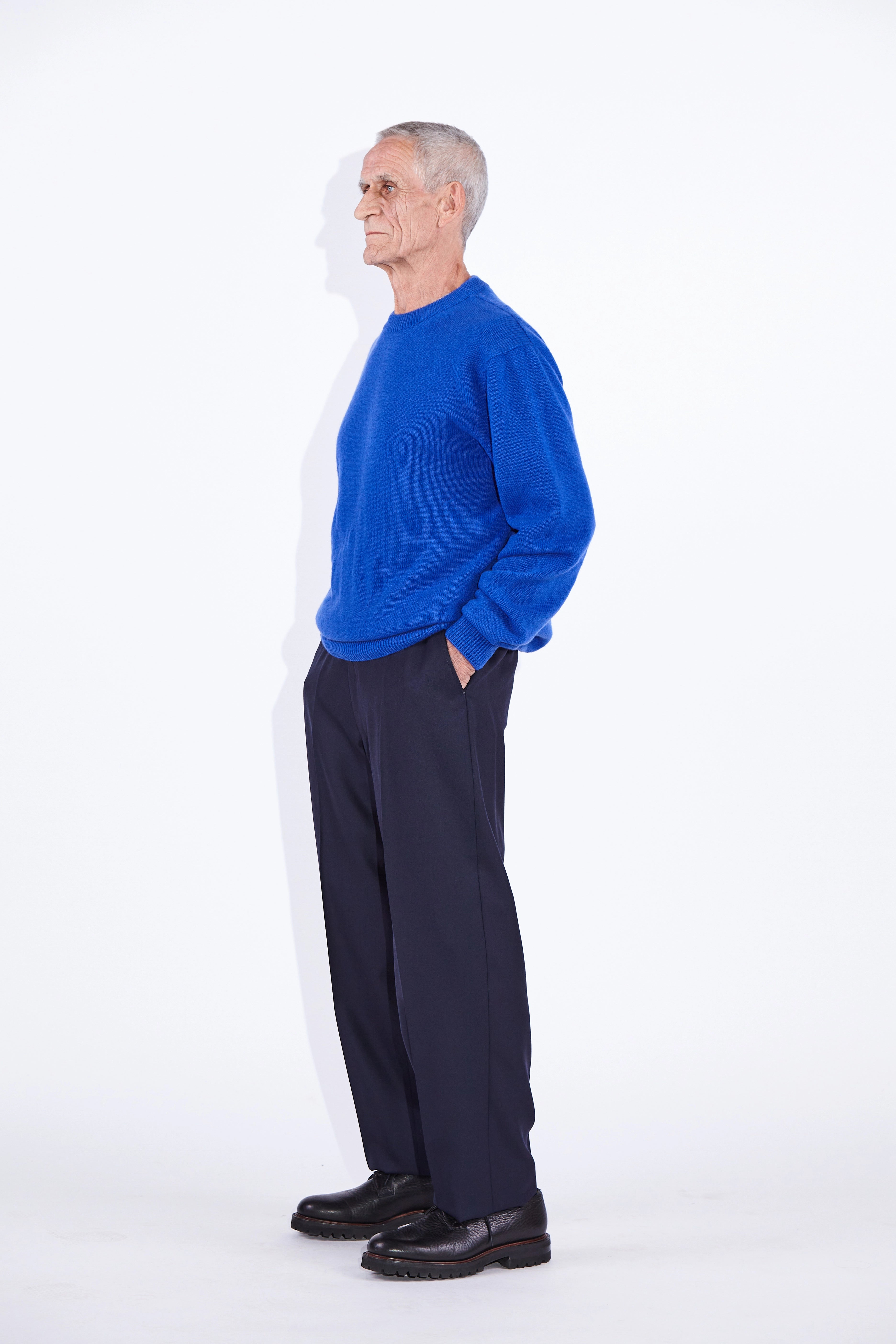 Model wears Casely-Hayford Rory Klein Cashmere Crew Neck Knit. 