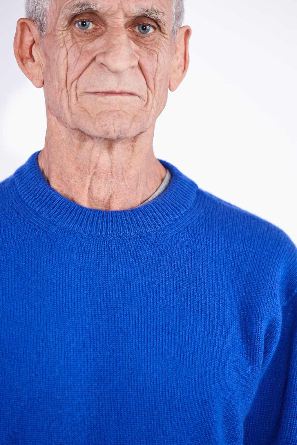 Model wears Casely-Hayford Rory Klein Cashmere Crew Neck Knit. 