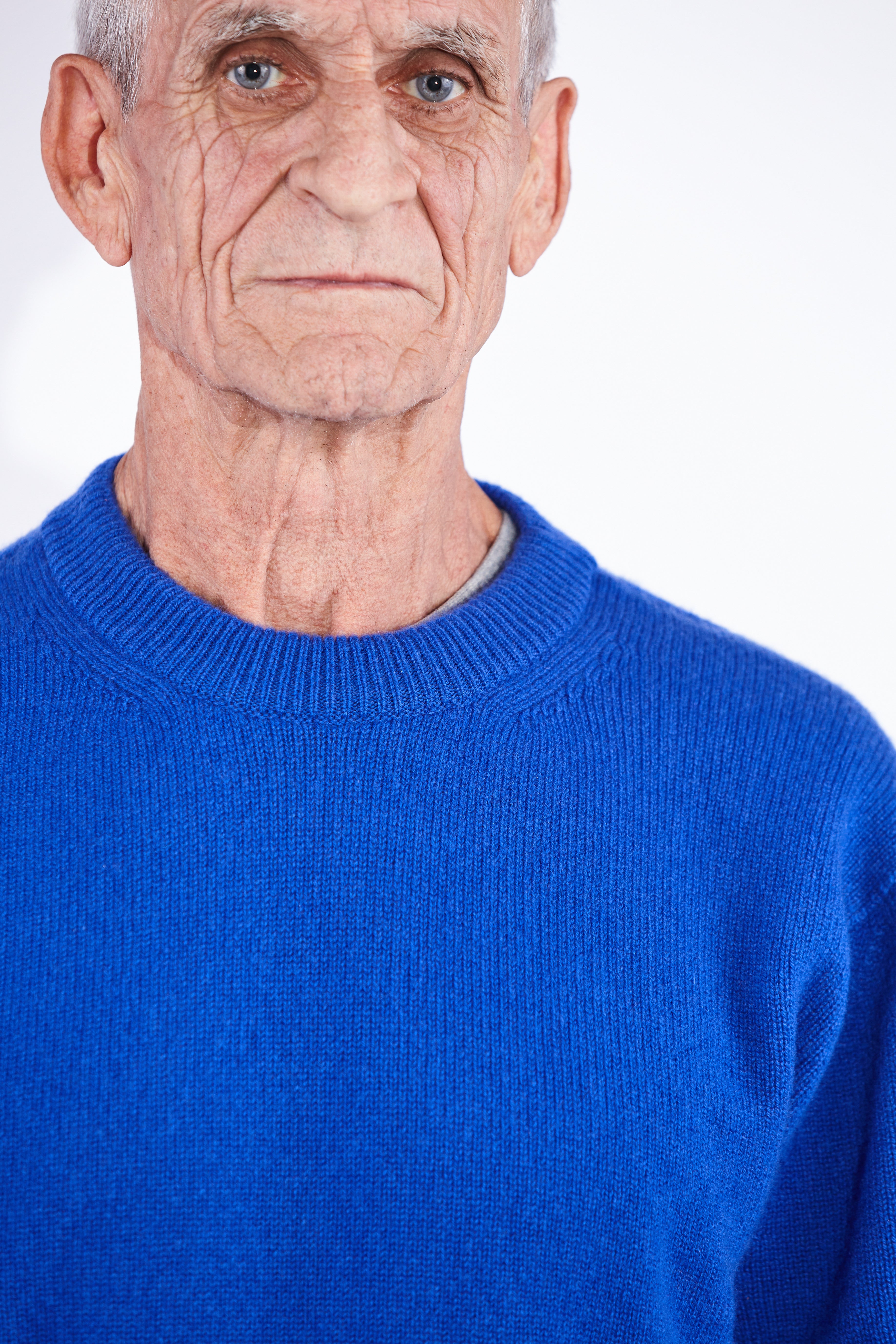 Model wears Casely-Hayford Rory Klein Cashmere Crew Neck Knit. 