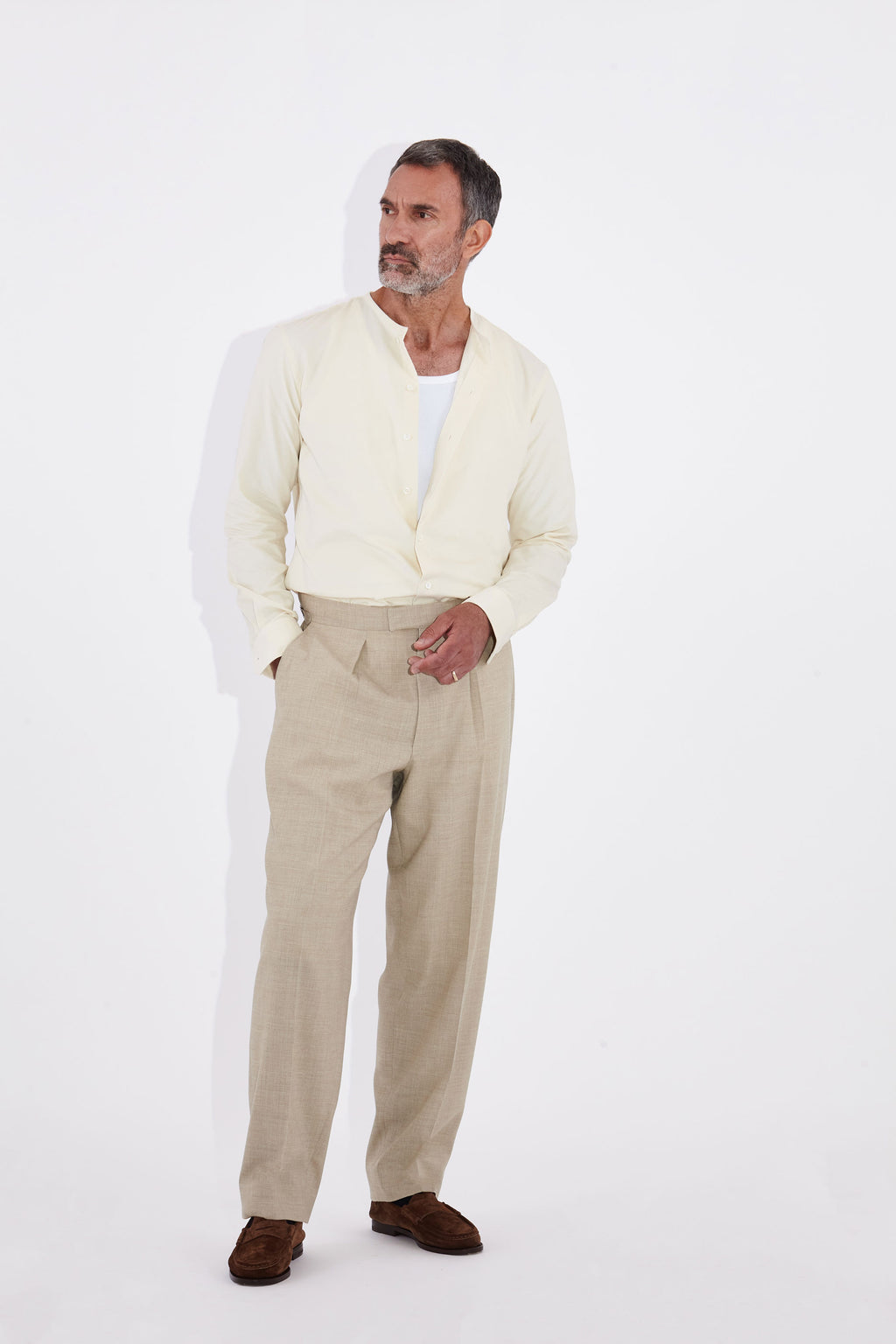 Model wears Casely-Hayford Pelle Collarless Shirt, Ivory Corduroy