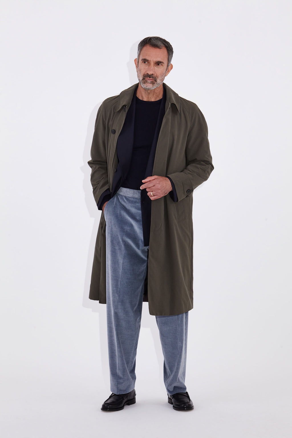 Model wears Casely-Hayford Klee Lovat Raglan Overcoat.