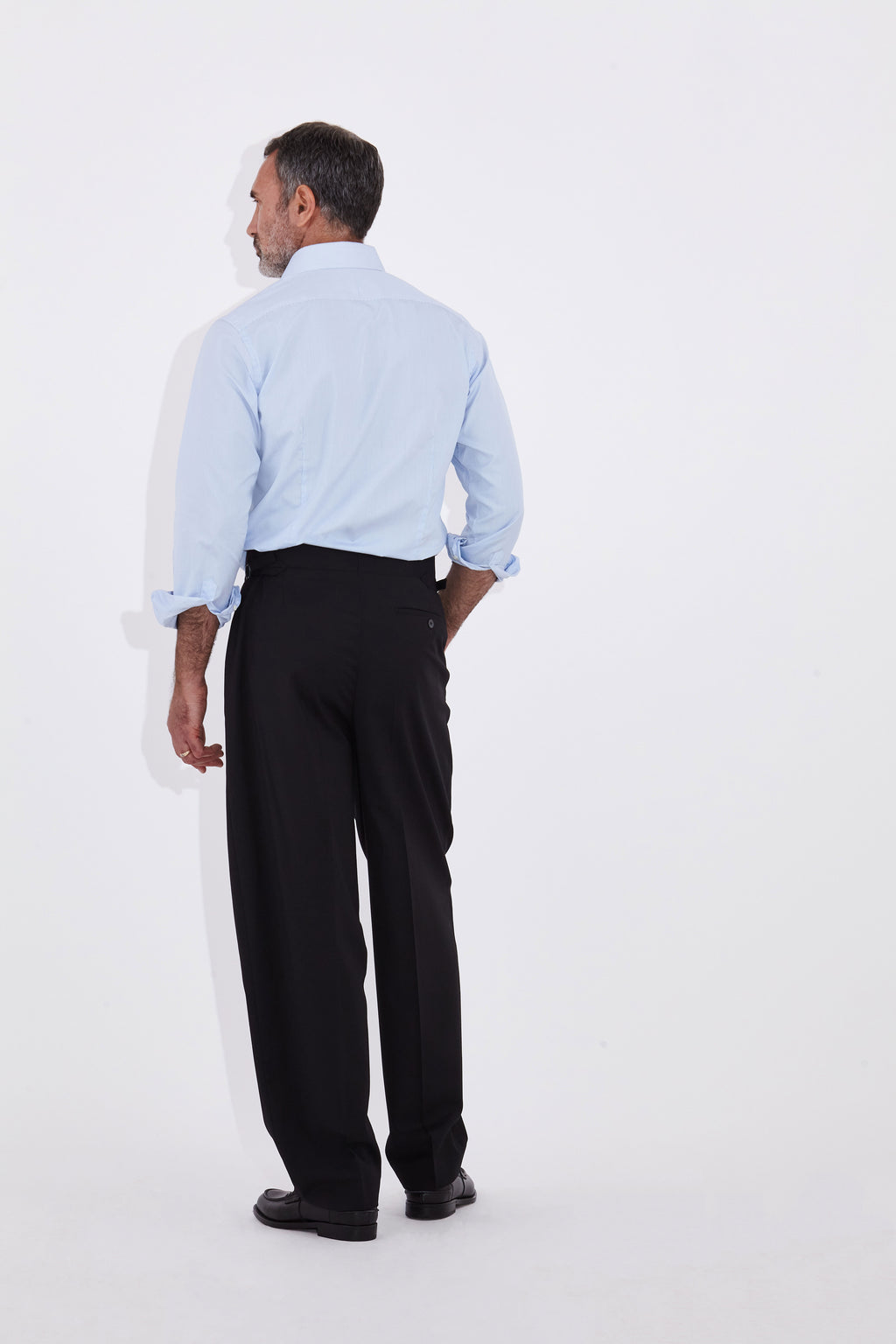 Model wears Casely Hayford Jackson Light Blue Oxford Classic London Collar Shirt. 