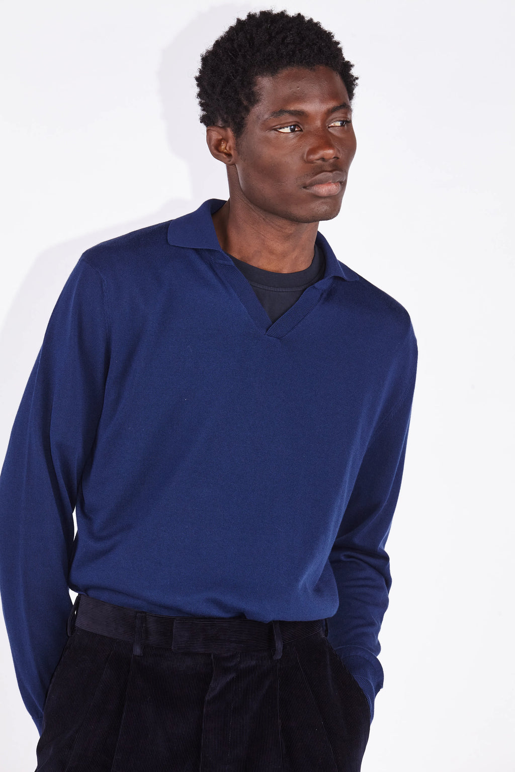 Model wears Casely-Hayford silk cotton knit in navy. 