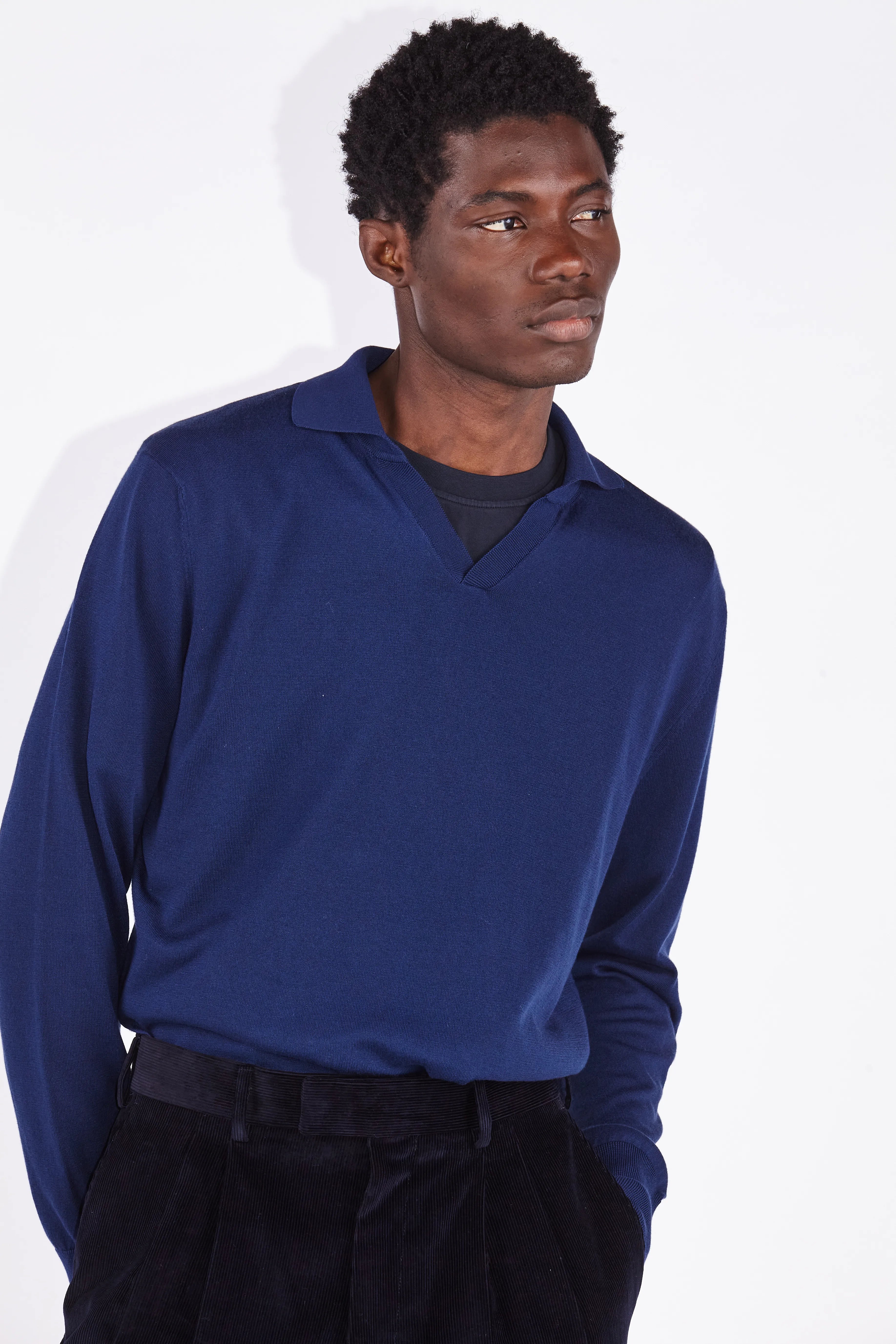 Model wears Casely-Hayford silk cotton knit in navy. 