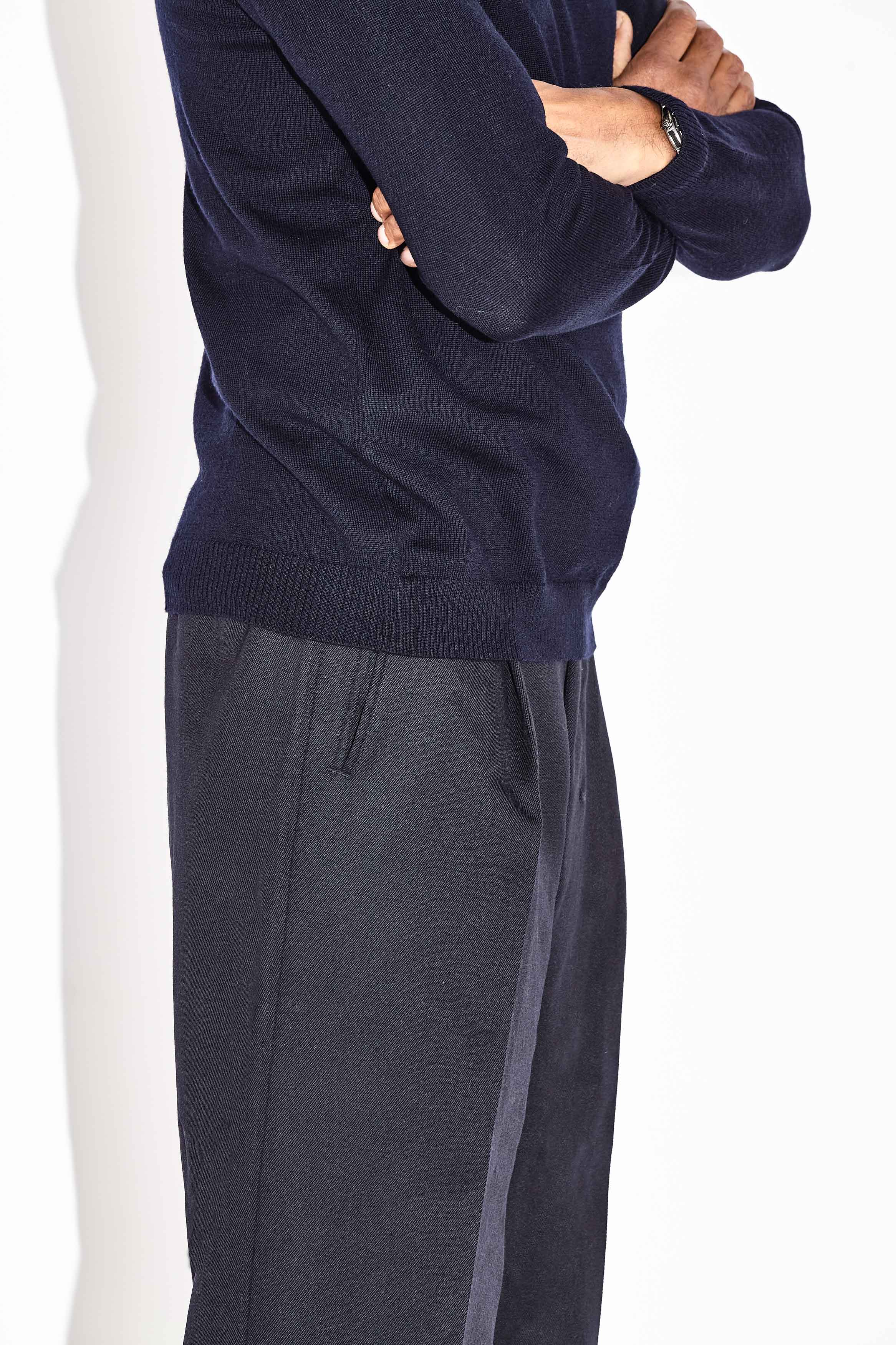 Model wears Casely-Hayford Augustin Charcoal Crew Neck Cotton Jumper.