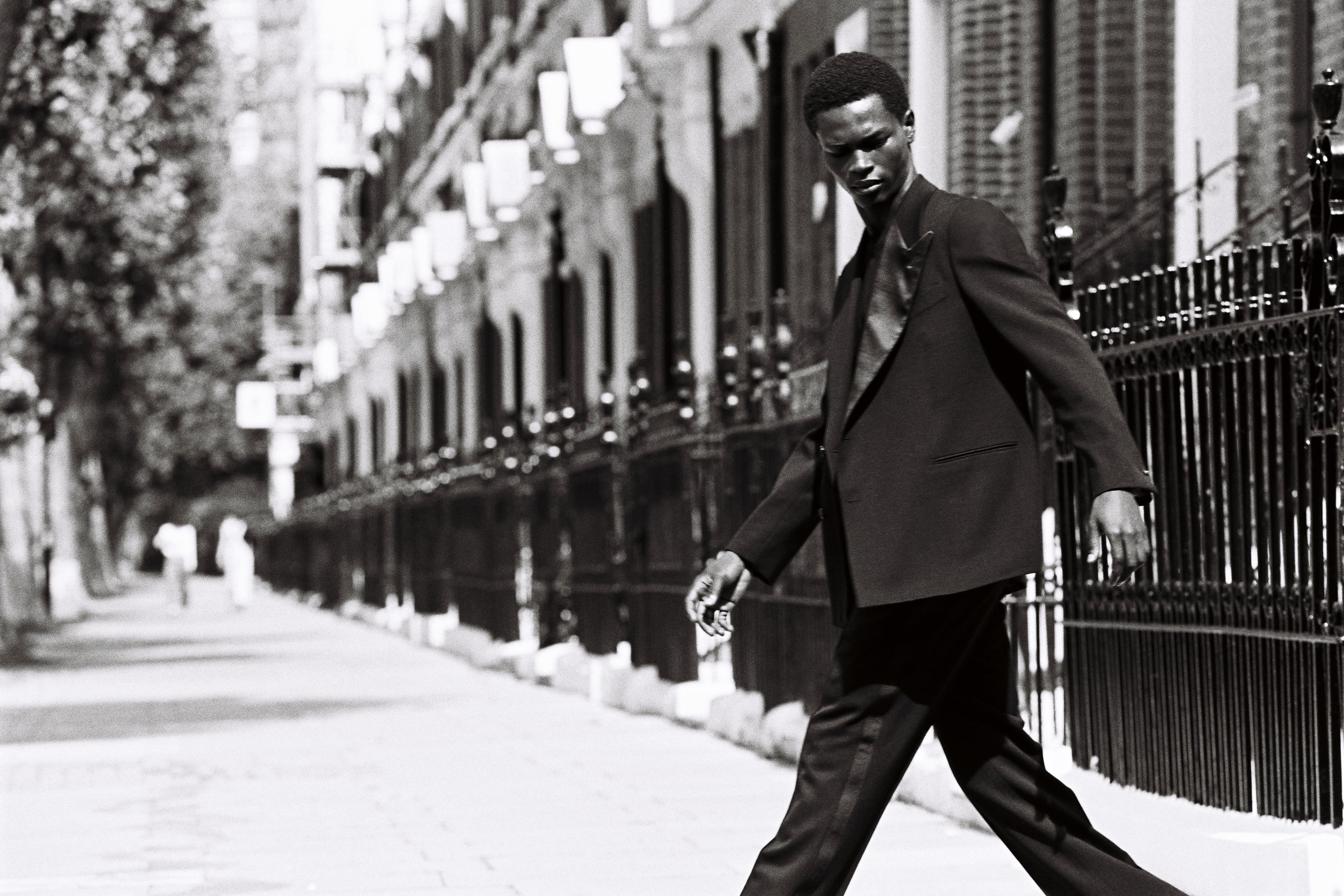 Model wears Casely-Hayford tuxedo in black. 