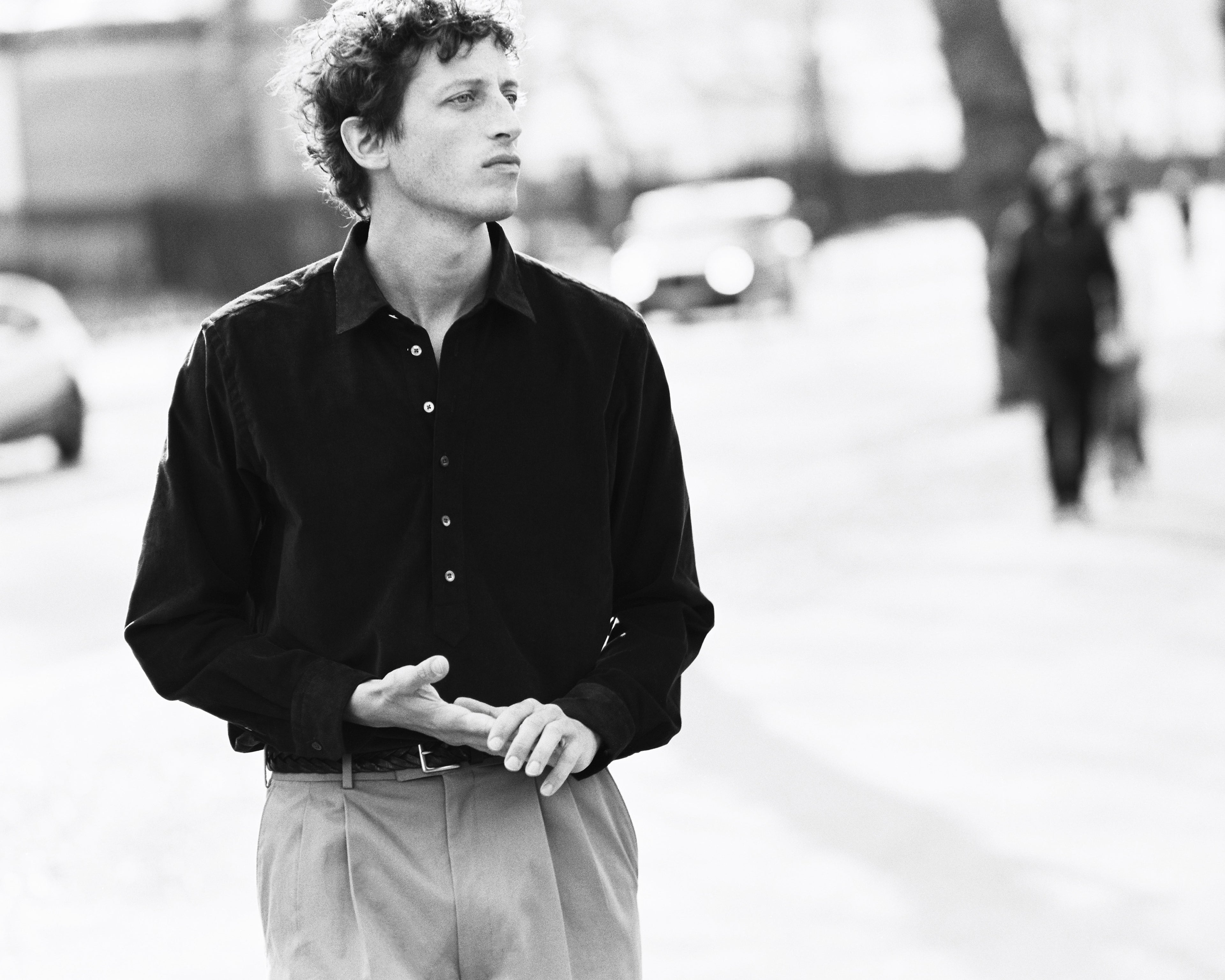 Model wears Casely-Hayford casual shirt paired with Ruben trousers. 
