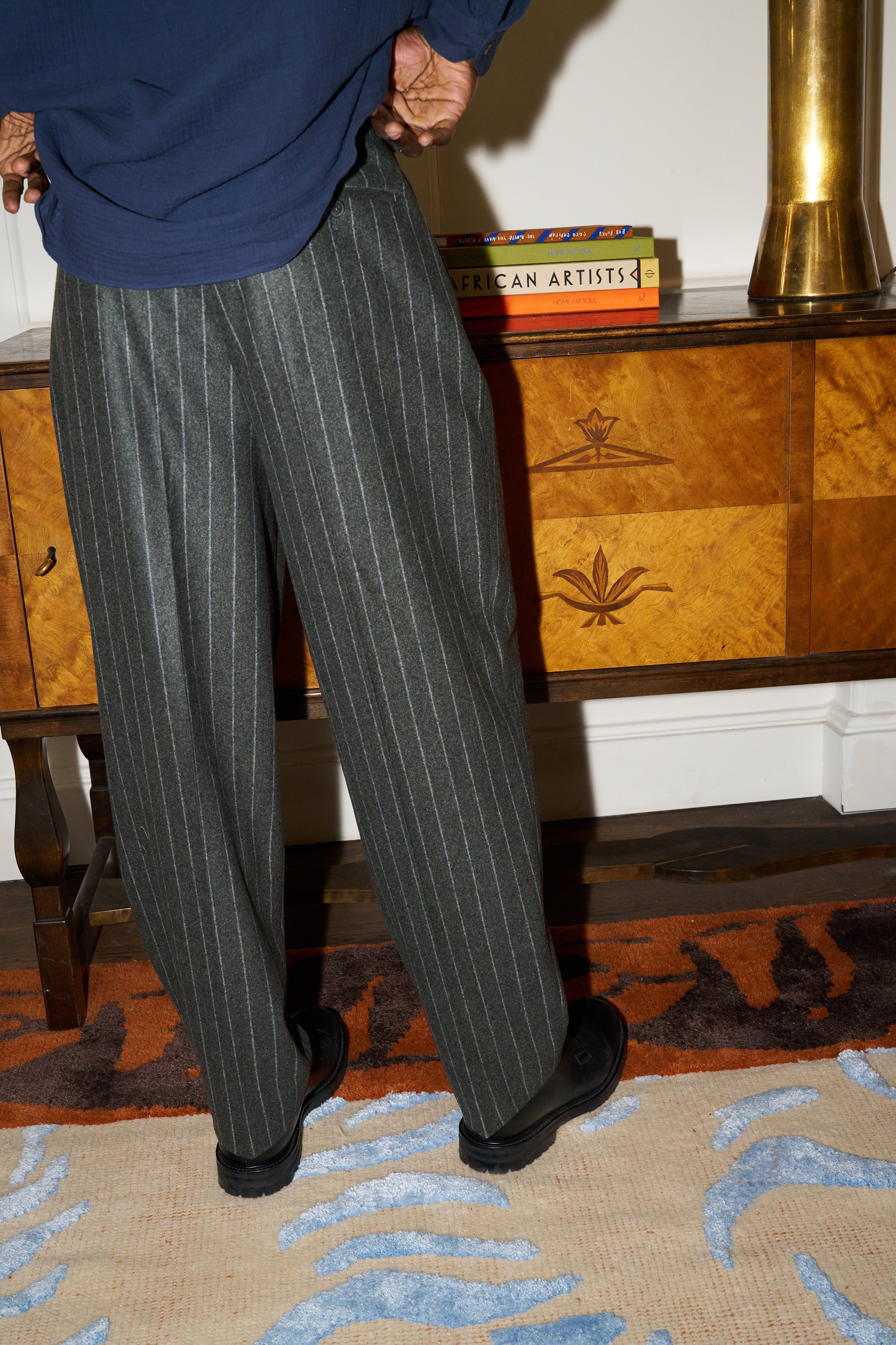 Model wears Casely-Hayford wide leg trousers