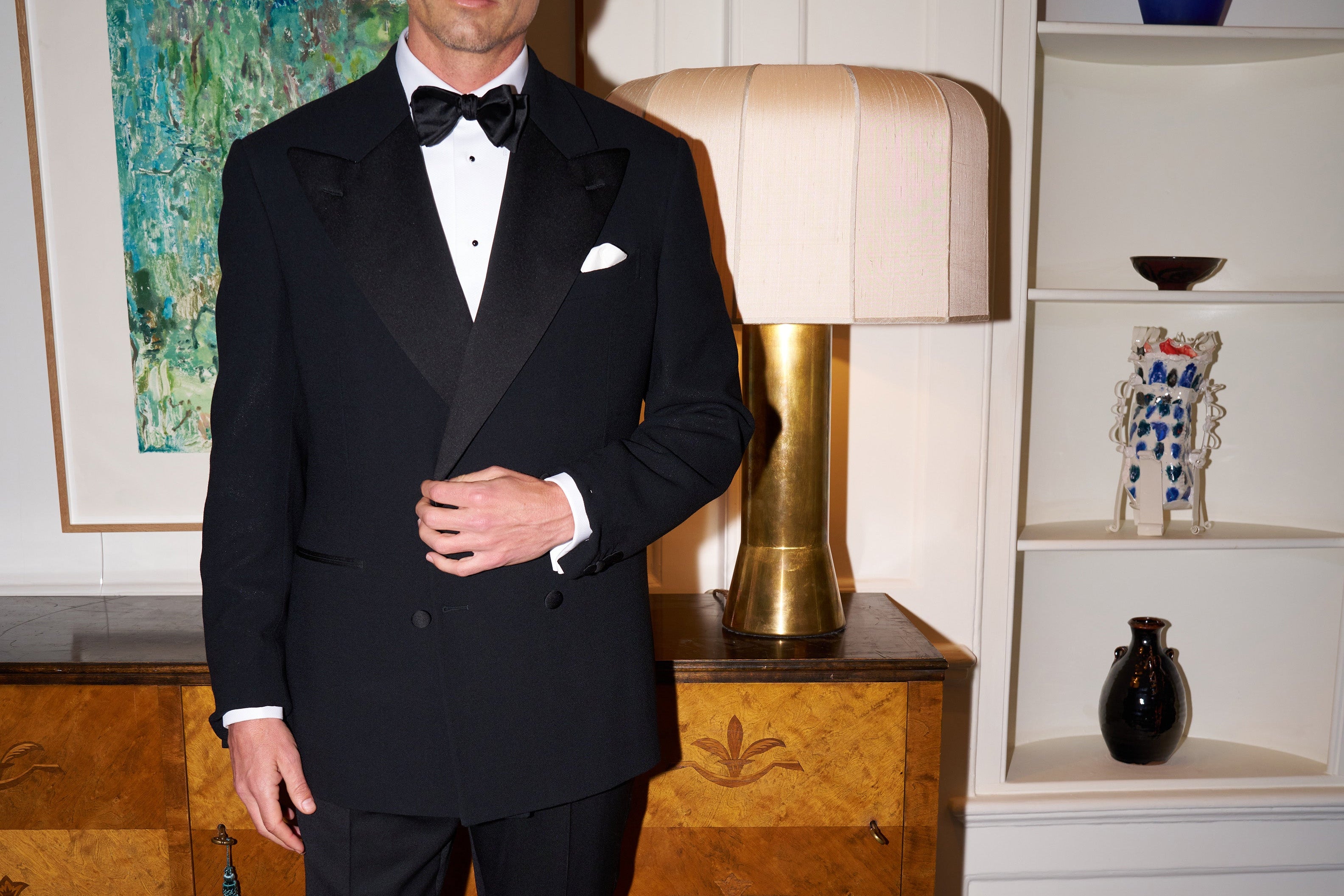 Model wears Casely-Hayford tuxedo in black.