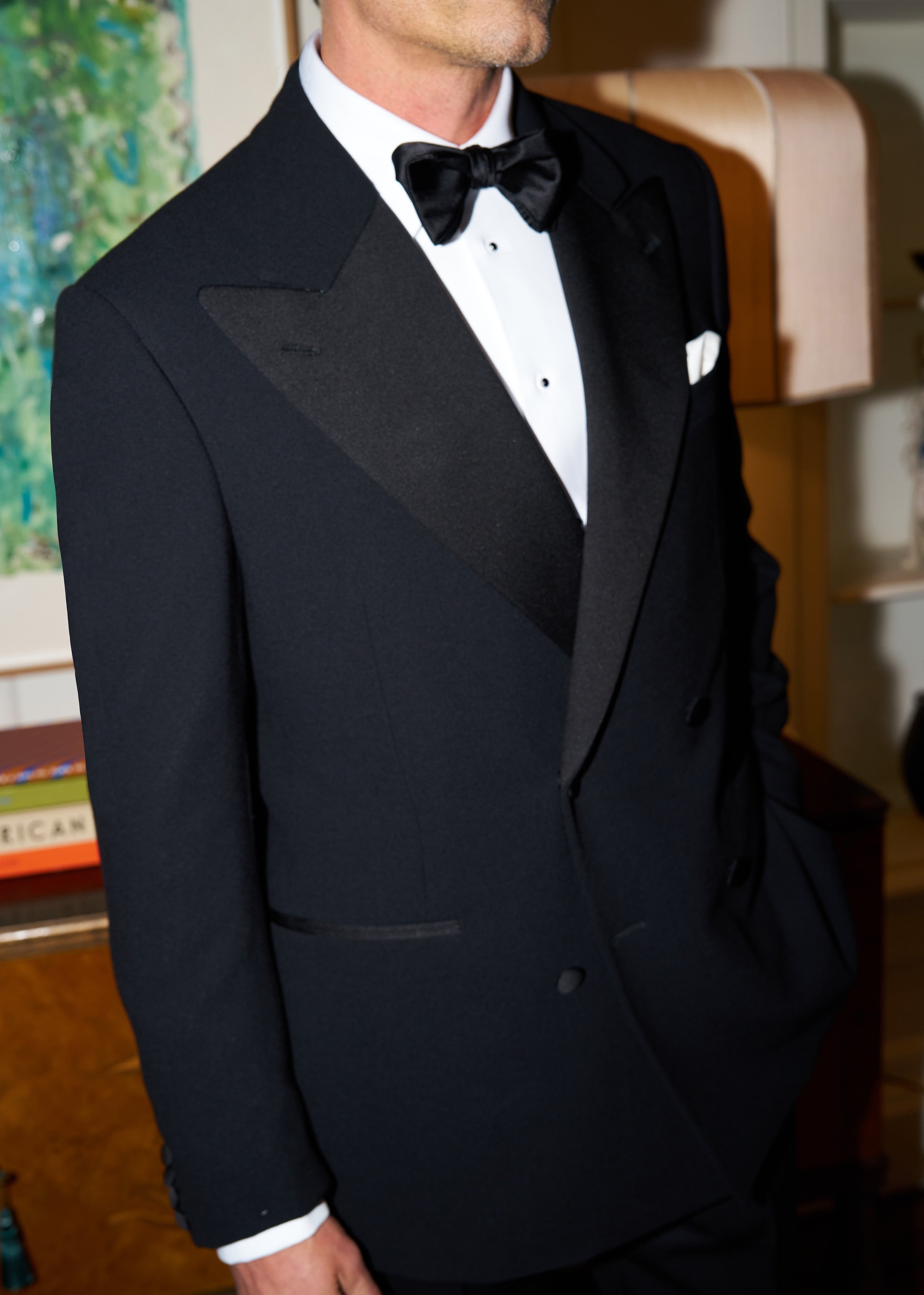 Model wears Casely-Hayford Tuxedo in black.