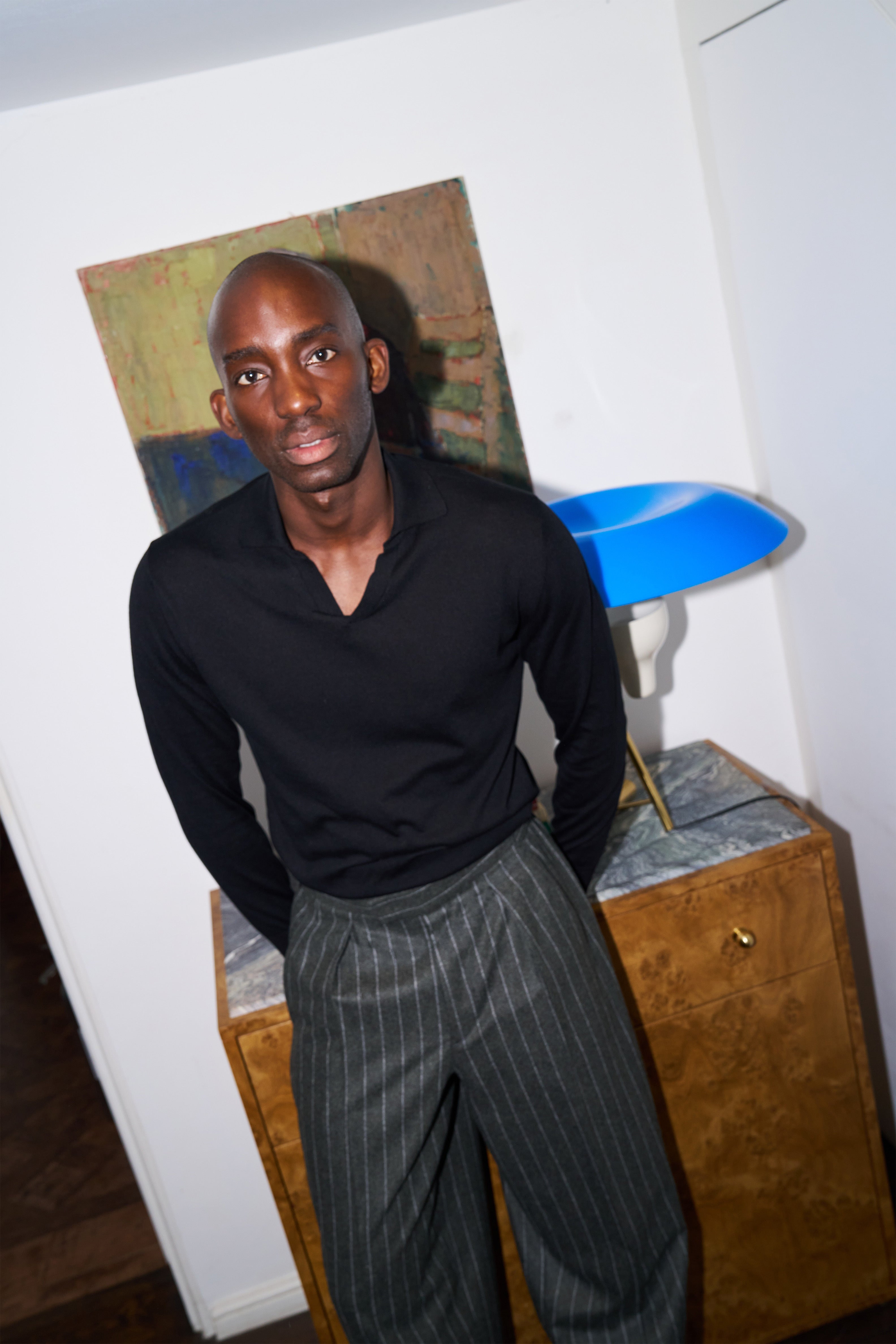 Model wear Casely-Hayford Caleb knit, paired with Hannes trousers. 