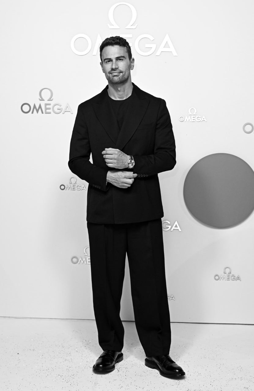 Actor Theo James wears Casely-Hayford Lakin two piece suit.