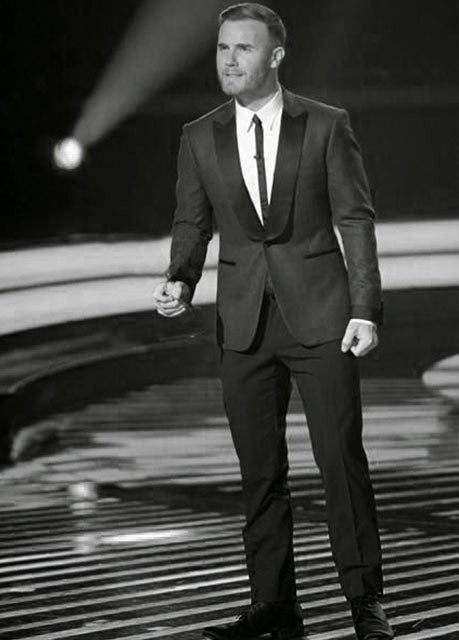 Gary Barlow wears a Casely-Hayford two-piece dinner TYSON suit.