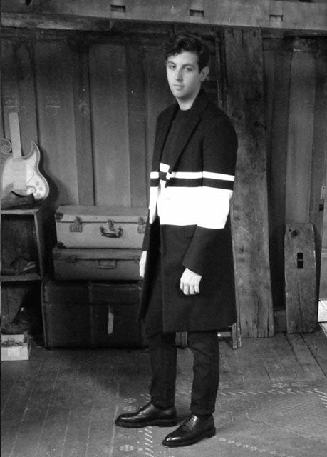 Jamie XX wears the Casely-Hayford ASHMORE single-breasted coat.