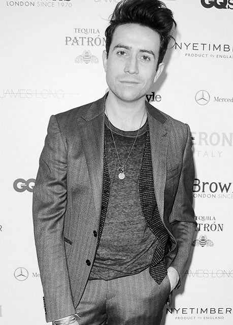 Nick Grimshaw wears head a Casely-Hayford CIRUS suit at a GQ event
