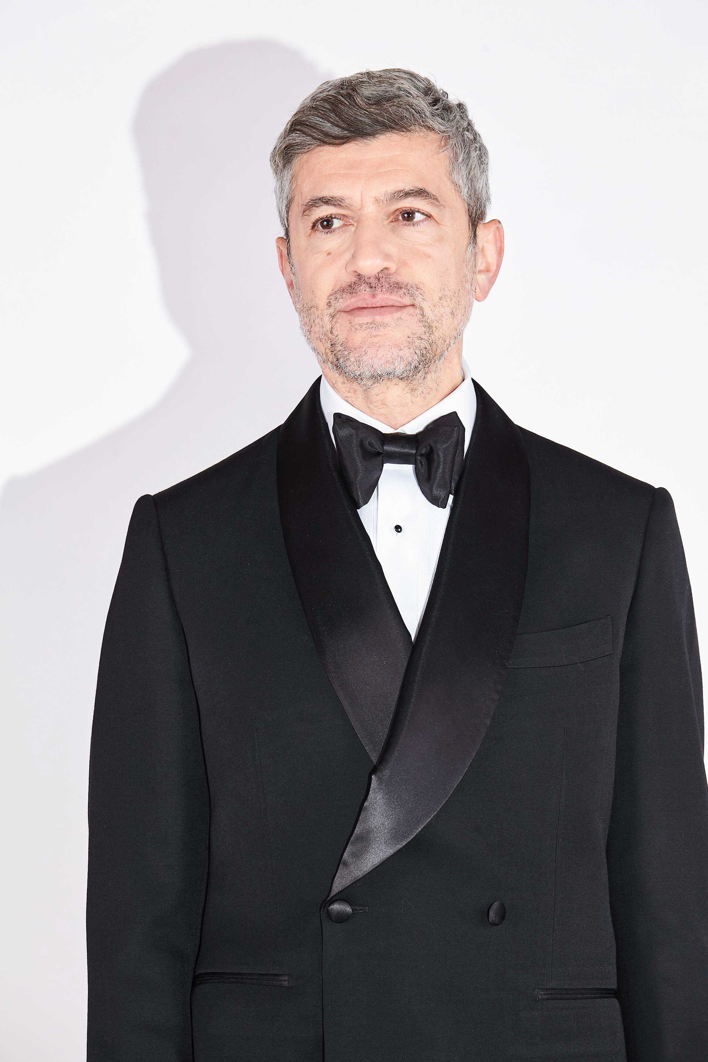 Model wears Casely-Hayford Pre-tied Handmade Silk Bow Tie.