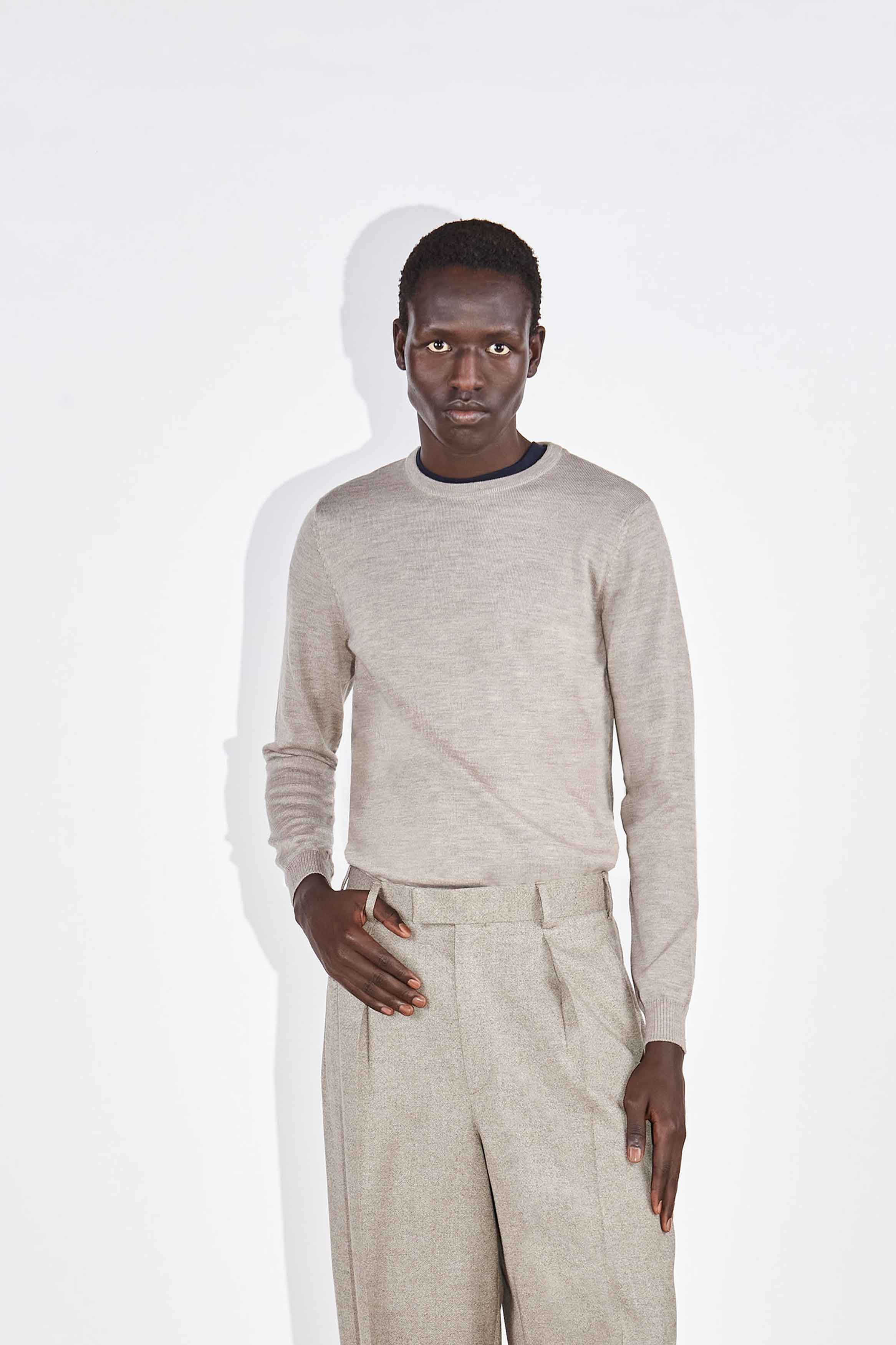 Model wears the Casely-Hayford Augustin crew neck jumper in Barley merino wool